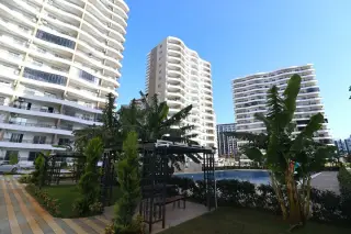 Квартира 2+1 в Арпачбахшиш, Эрдемли с современным дизайном · Фото 6