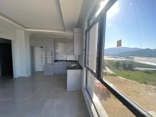Alanya Ishakli 1+1 Apartment with View on 4th Floor · Photo 16