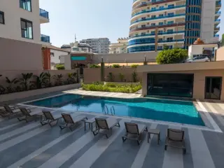 Квартира 1+1 с социальными удобствами в Махмутларе, в 450 м от моря · Фото 10