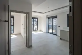 Квартира 1+1 с социальными удобствами в Махмутларе, в 450 м от моря · Фото 24