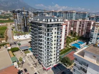 Квартира 1+1 с социальными удобствами в Махмутларе, в 450 м от моря · Фото 2
