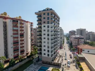 Квартира 1+1 с социальными удобствами в Махмутларе, в 450 м от моря · Фото 3