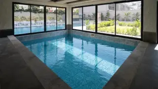 Квартира 1+1 с социальными удобствами в Махмутларе, в 450 м от моря · Фото 15