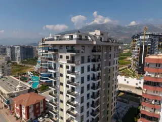 Квартира 1+1 с социальными удобствами в Махмутларе, в 450 м от моря · Фото 5