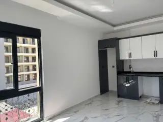 Alanya Mahmutlar'da Havuzlu 1+1 Satılık Daire · Fotoğraf 18
