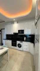Квартира 1+1 в Махмутлар, Алания, рядом с морем · Фото 12